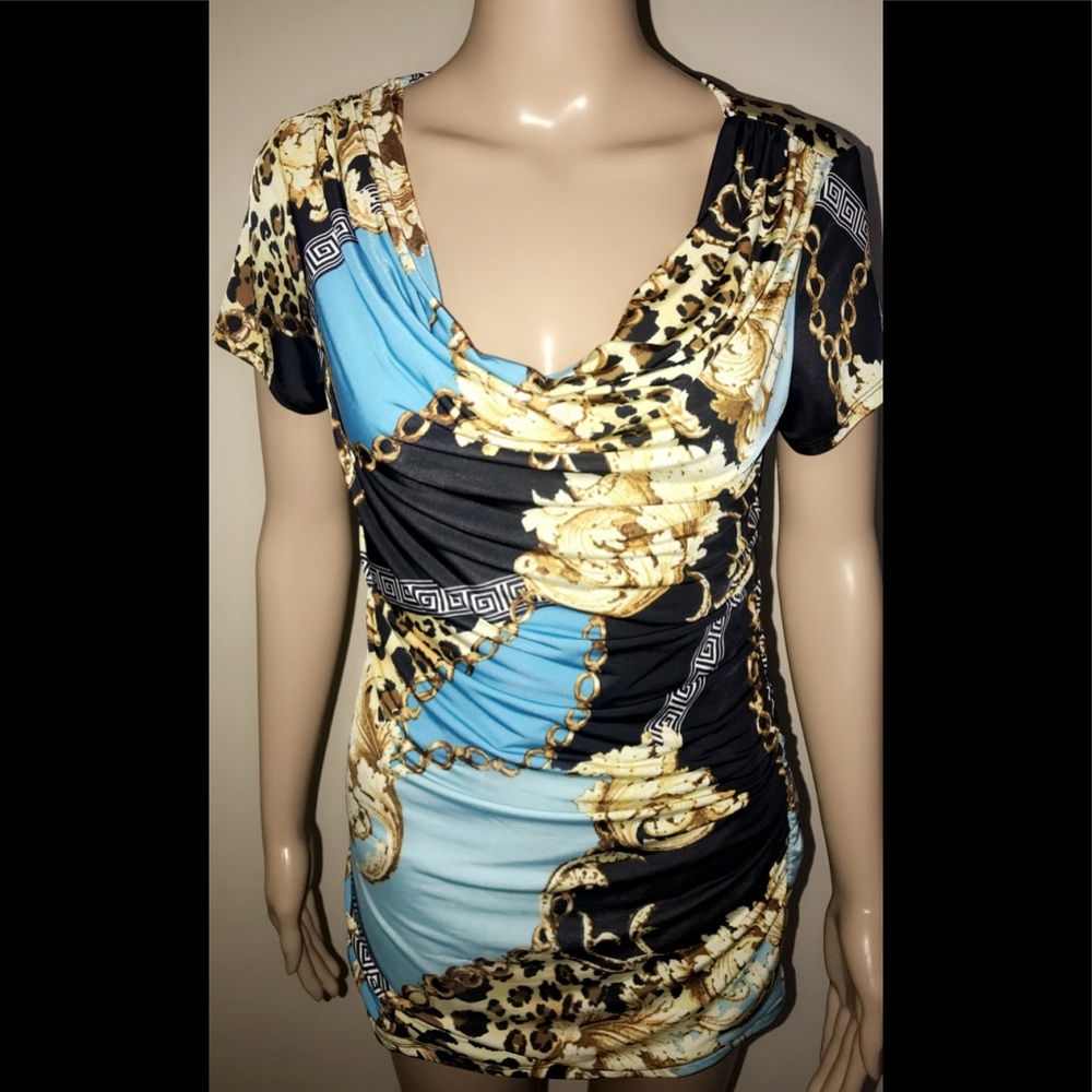 Carmen Marc Valvo blouse with print.